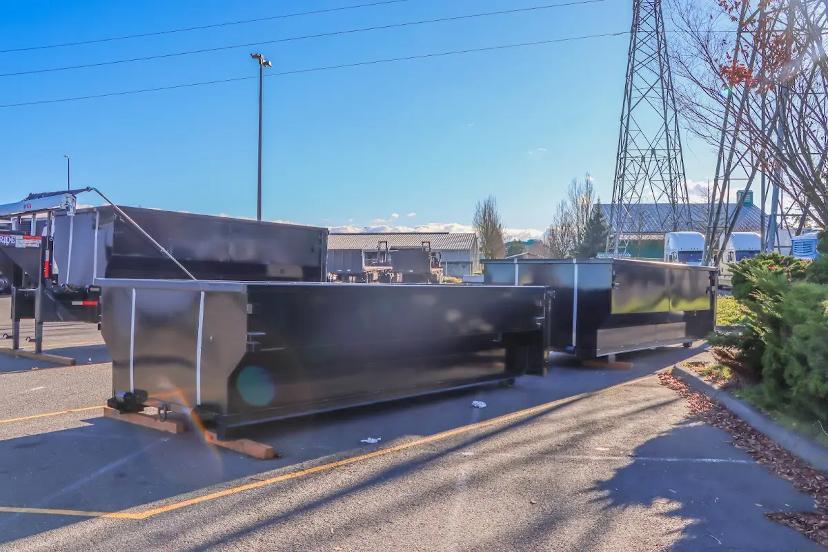 Roll-off dumpster ready for waste disposal at job site for 12 Yard Dumpster Rental in Kasson